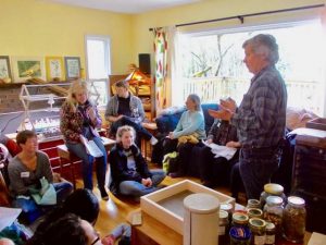 Michael-teaching-a-class-on-growing-and-processing-medicinal-plants