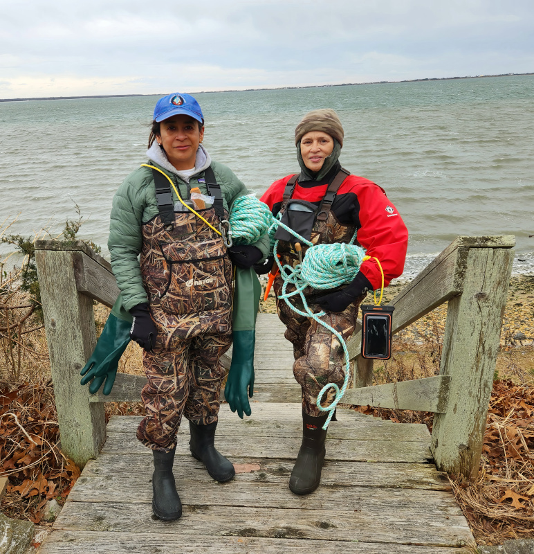 Heading into the frigid waters to check kelp growth -